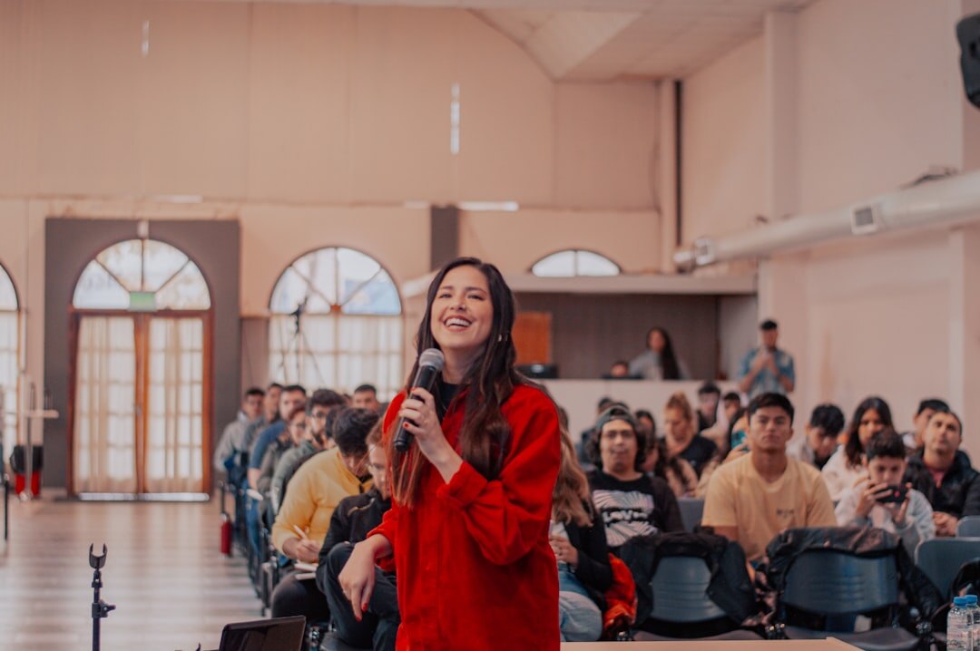 confident speaker on stage