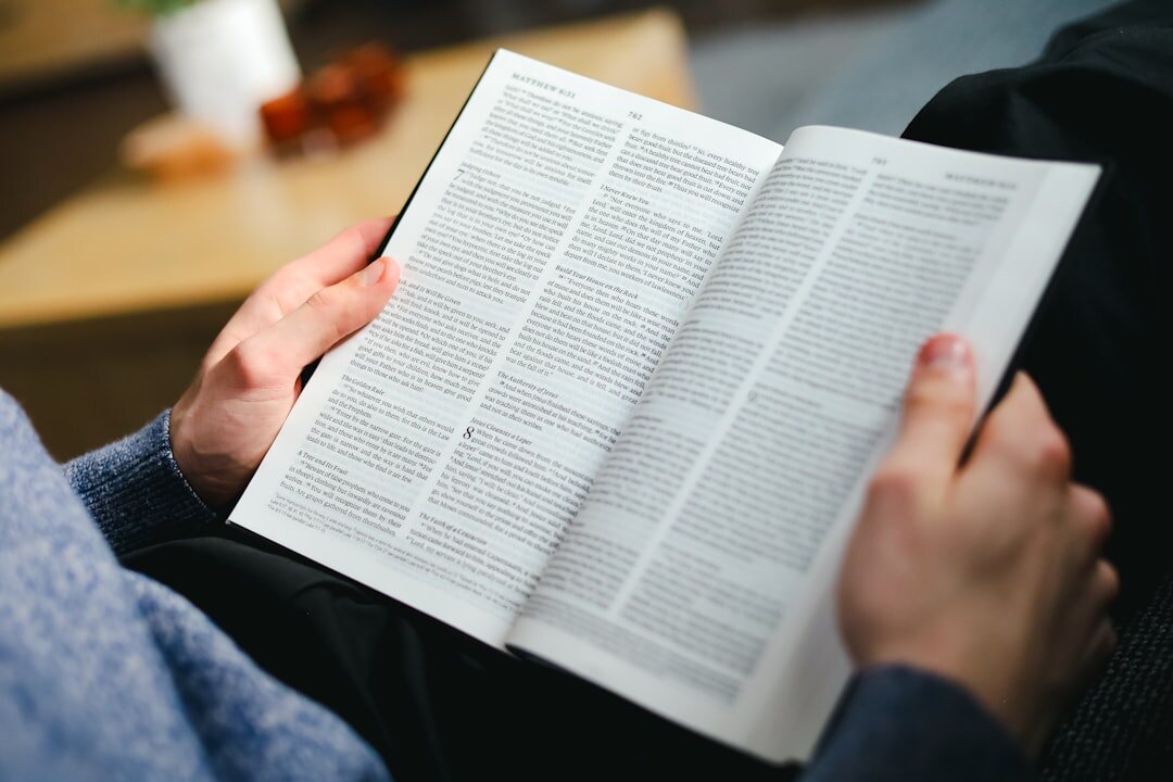 person reading book quietly