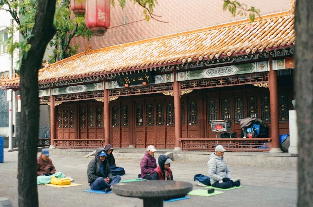 person meditating outdoors
