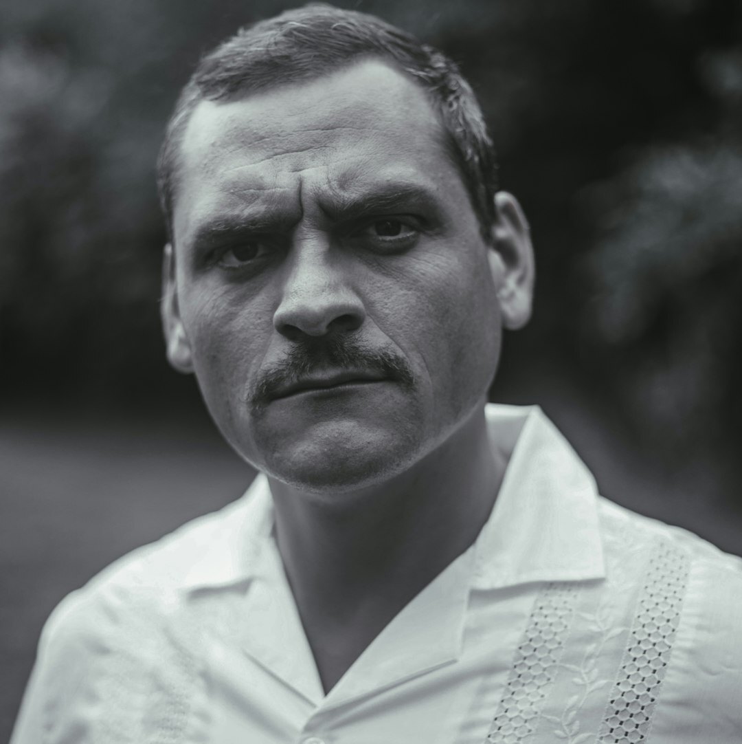 Studio portrait of a brazilian man coach smiling